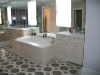 honed-calacatta-gold-marble-master-vanity-and-tubdeck